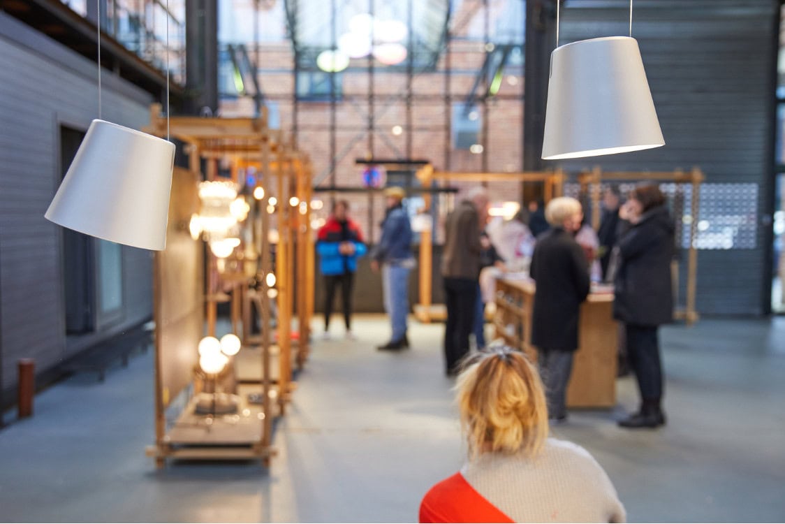 An exhibition room with lamps. 